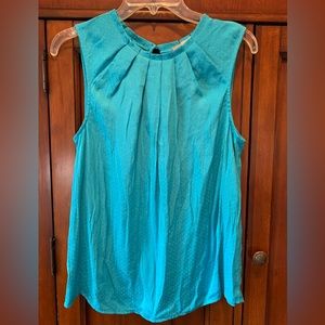 Blue satin sleeveless blouse